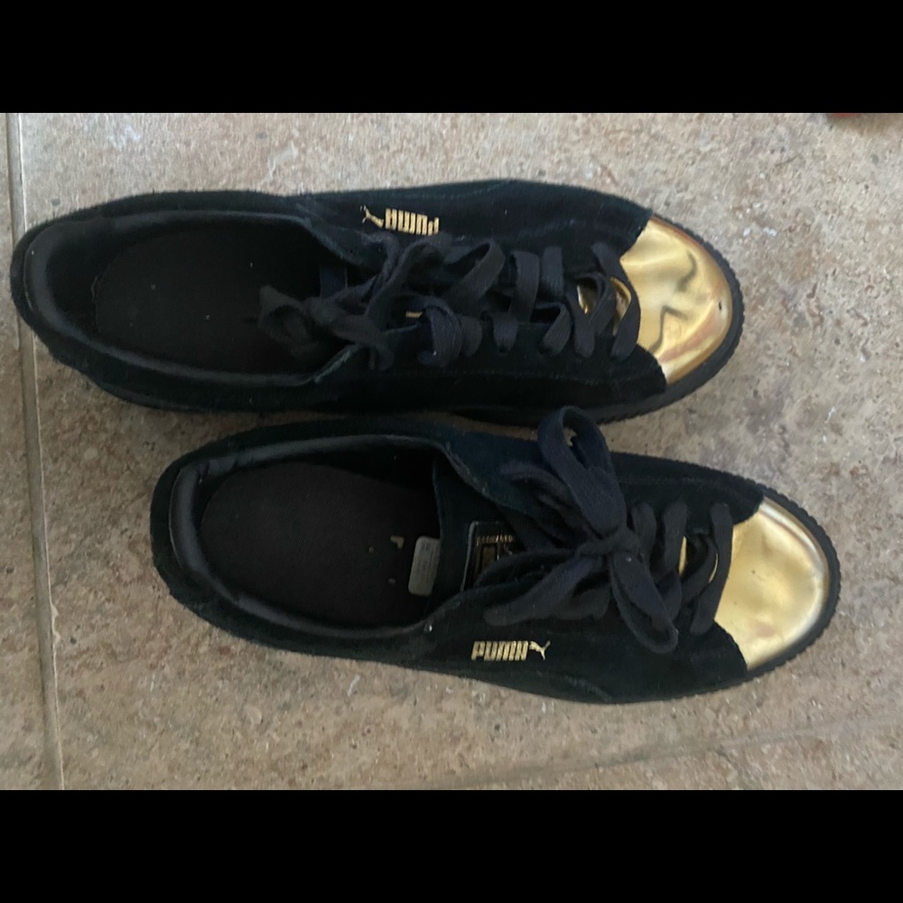 Puma moccasins with golden accents